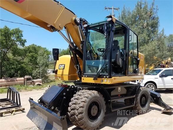 CAT M318F Bagri na kolesih