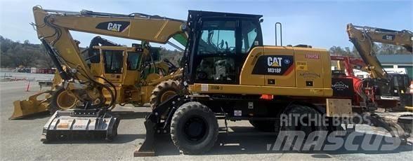 CAT M318F Bagri na kolesih