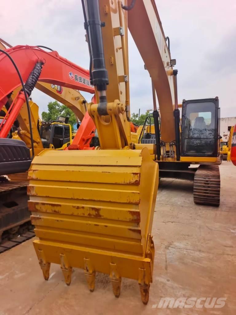 CAT 323 GC Bagri goseničarji