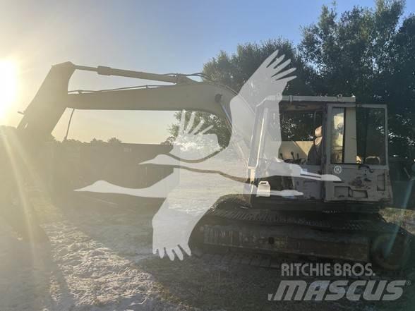 CAT 235B Bagri goseničarji
