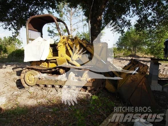John Deere 450 Nakladalci goseničarji