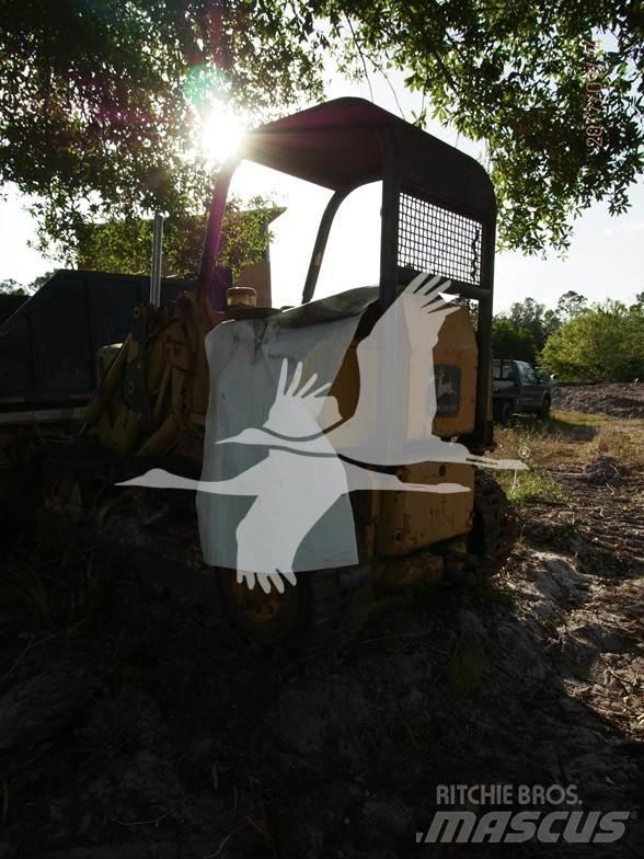 John Deere 450 Nakladalci goseničarji