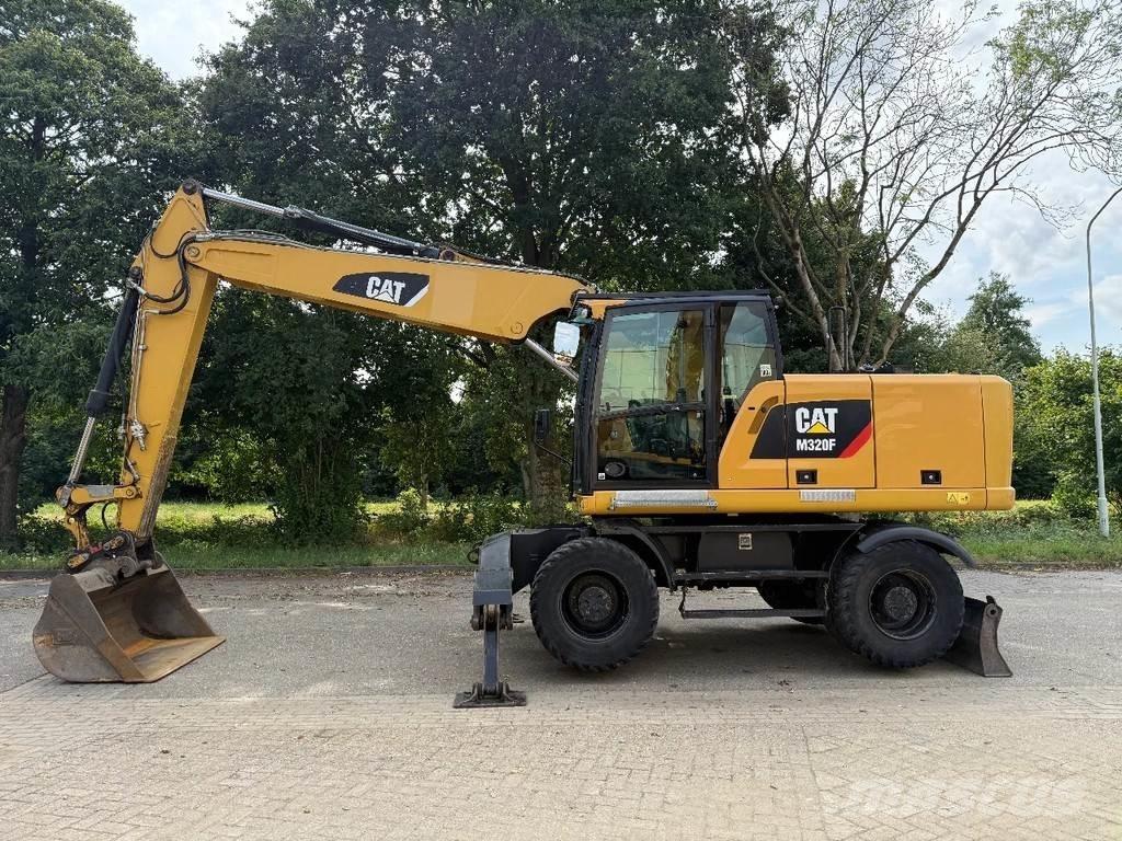 CAT M320F Bagri na kolesih