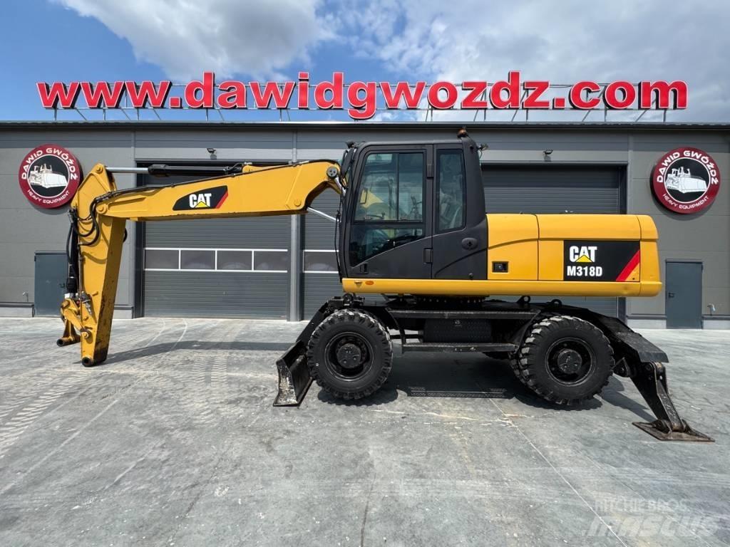 CAT M 318 D Bagri na kolesih