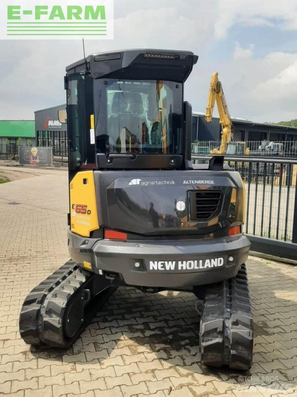New Holland e65d Bagri na kolesih