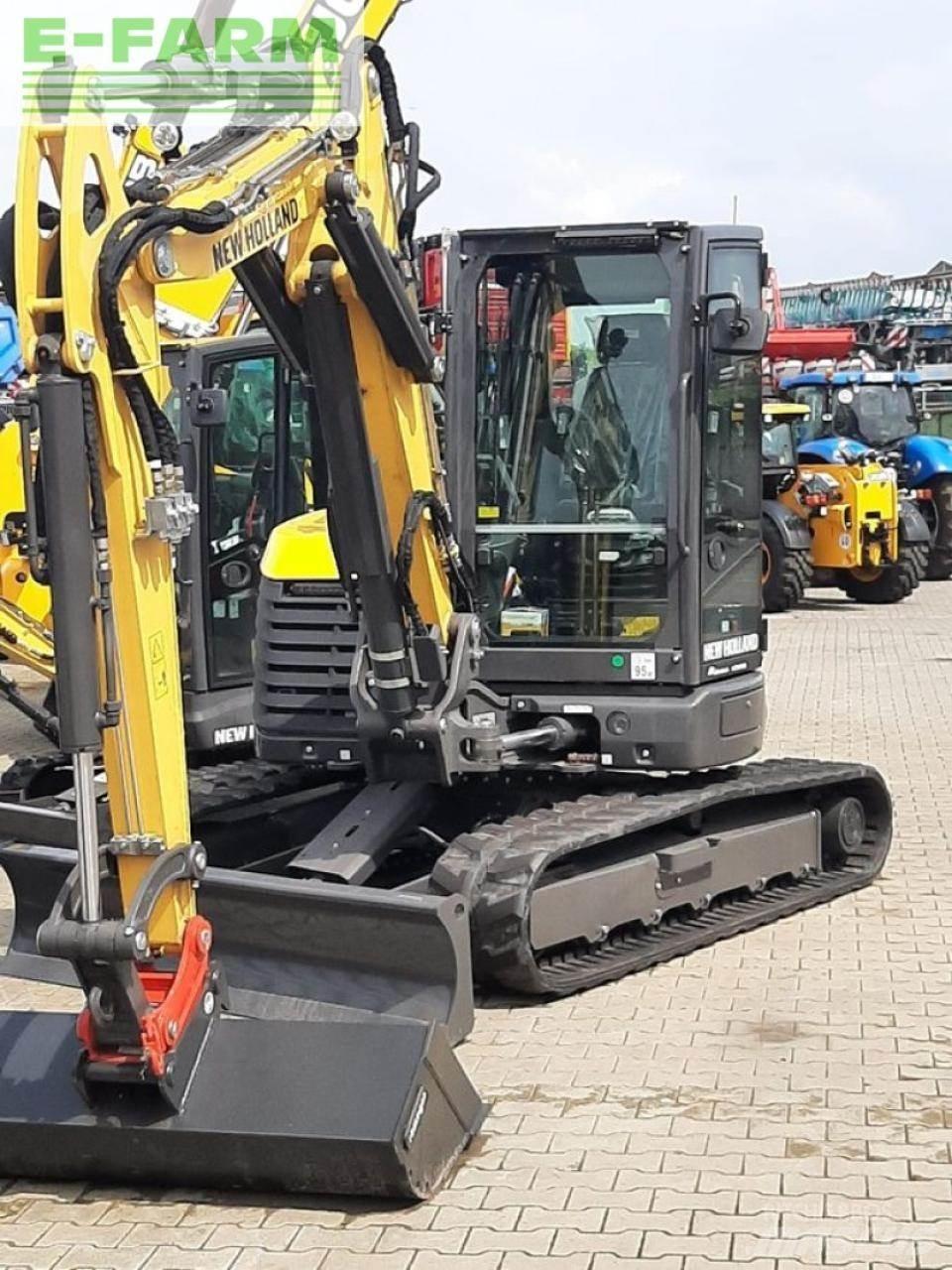New Holland e65d Bagri na kolesih