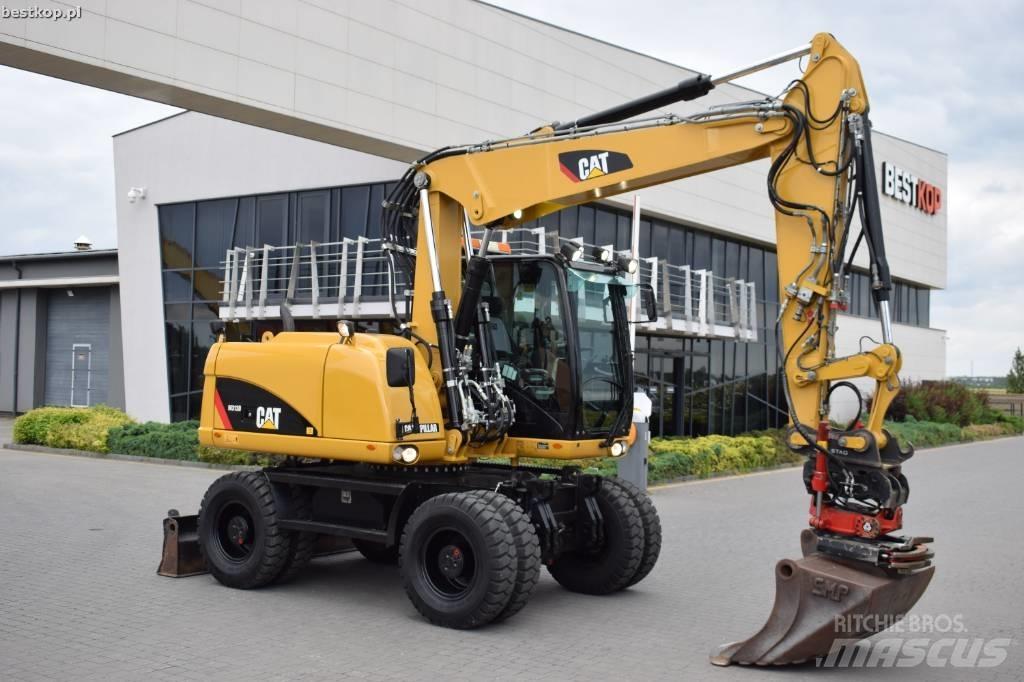 CAT M 313 D Bagri na kolesih