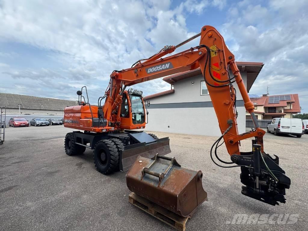 Doosan DX 140 W Bagri na kolesih