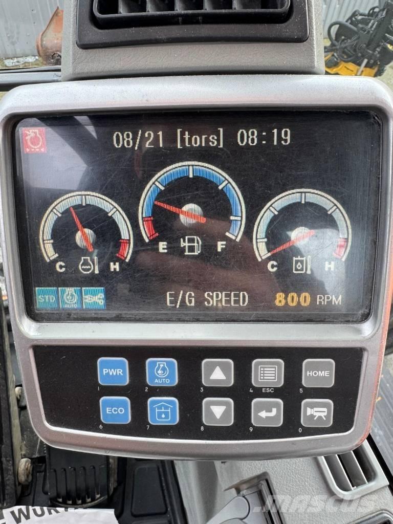 Doosan DX 140 W Bagri na kolesih