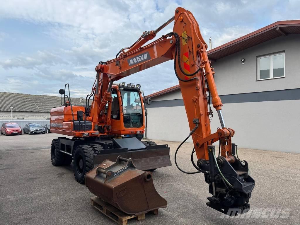 Doosan DX 140 W Bagri na kolesih