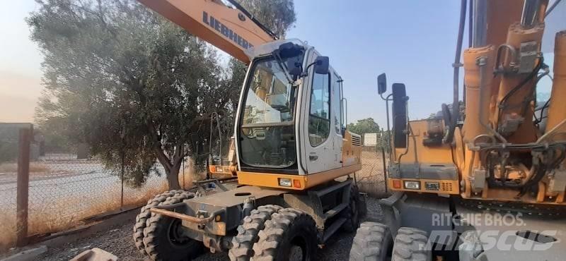 Liebherr A 904 C Bagri na kolesih