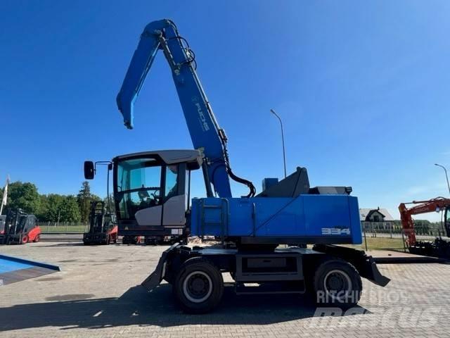 Fuchs MHL 334F Bagri za prekladanje primarnih/sekundarnih surovin