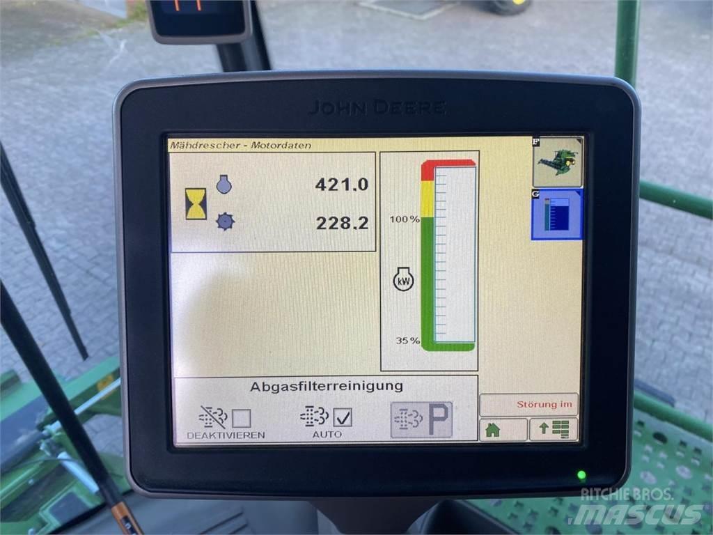 John Deere T550 Kombajni