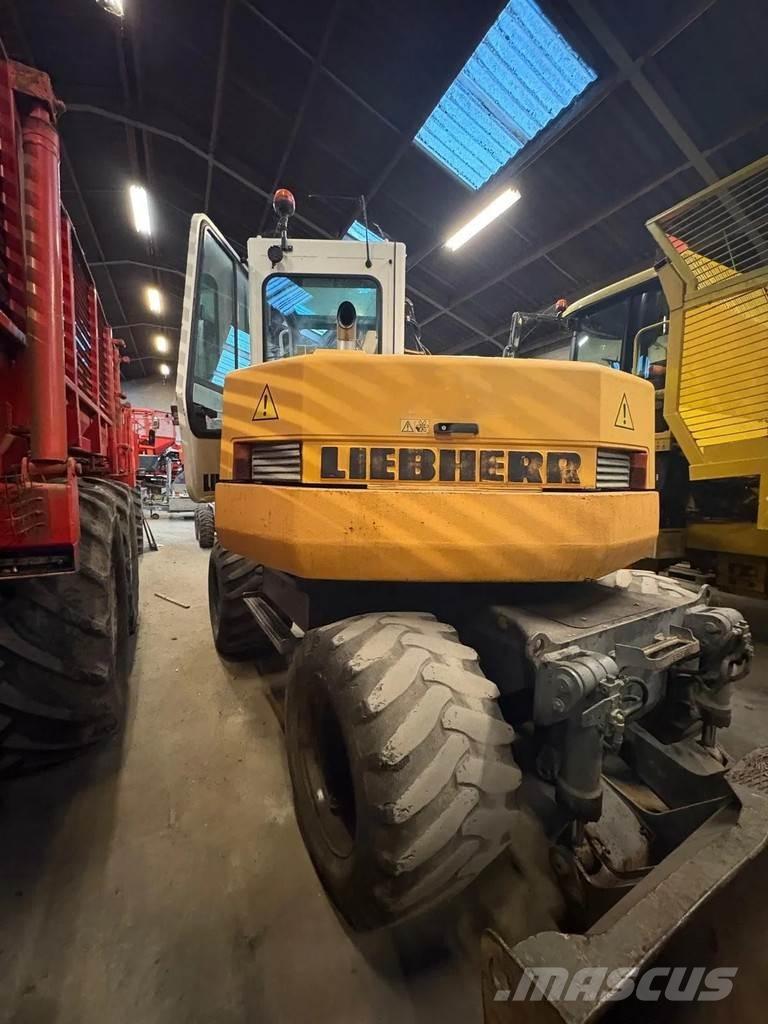 Liebherr A308 Bagri na kolesih