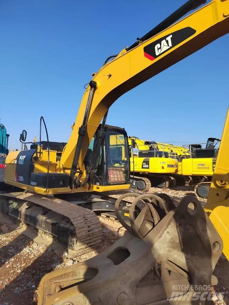 CAT 318 Bagri goseničarji