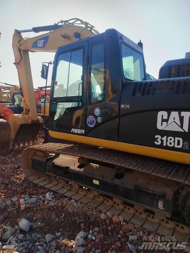 CAT 318 Bagri goseničarji