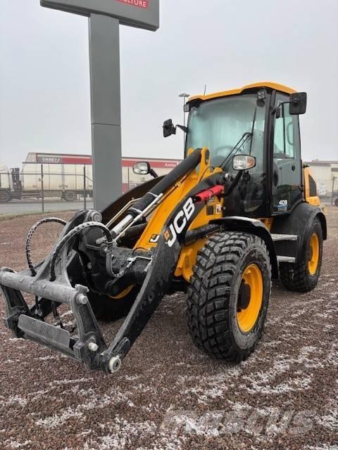 JCB 409 Kolesni nakladalci
