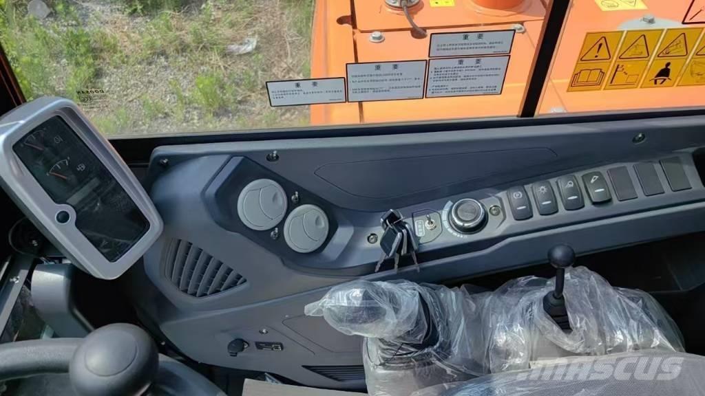 Develon DX60W ECO Bagri na kolesih