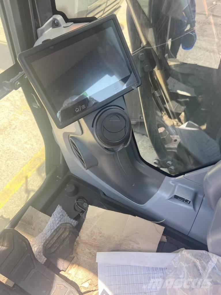 Develon DX 450 Bagri goseničarji