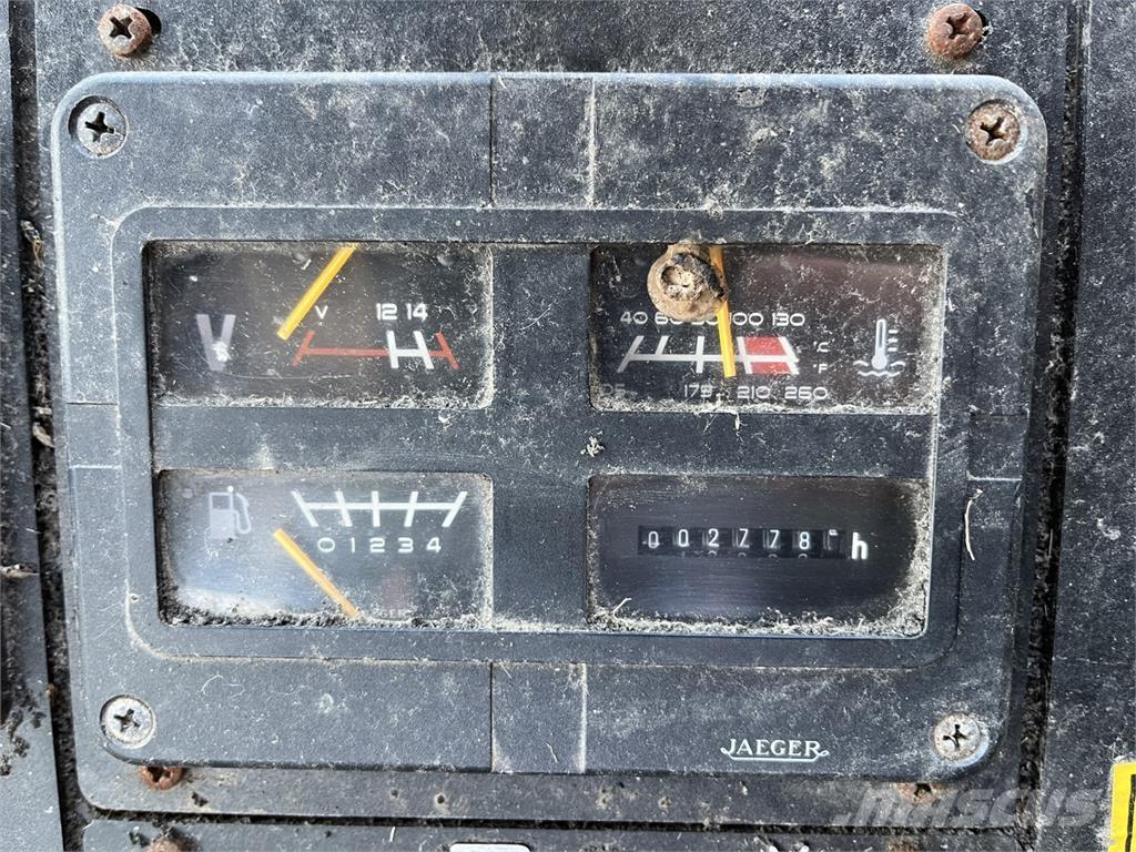 New Holland TX 32 Kombajni