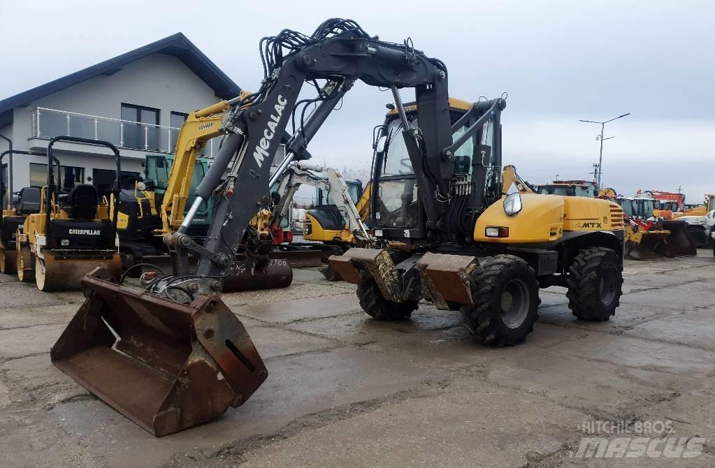 Mecalac 12 M TX Bagri na kolesih