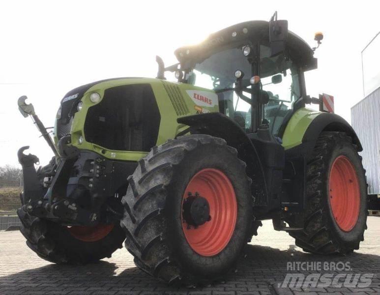 CLAAS AXION 810 Traktorji