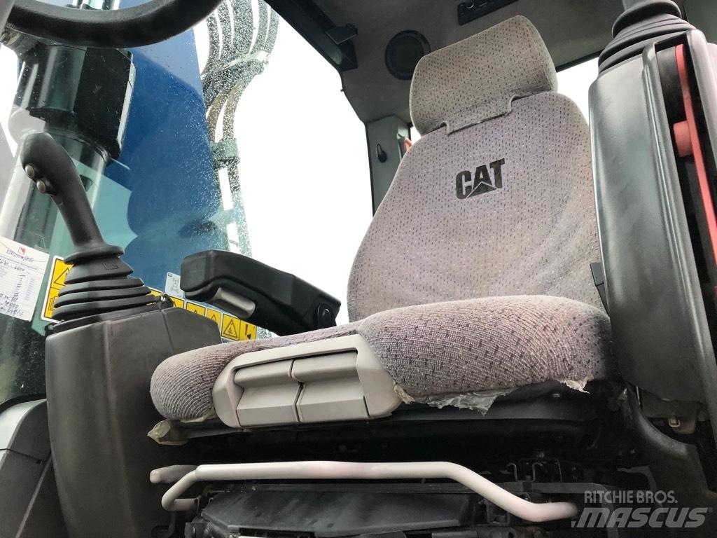 CAT M318F Bagri na kolesih