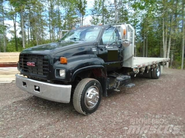GMC C6500 Tovornjaki s kesonom/platojem