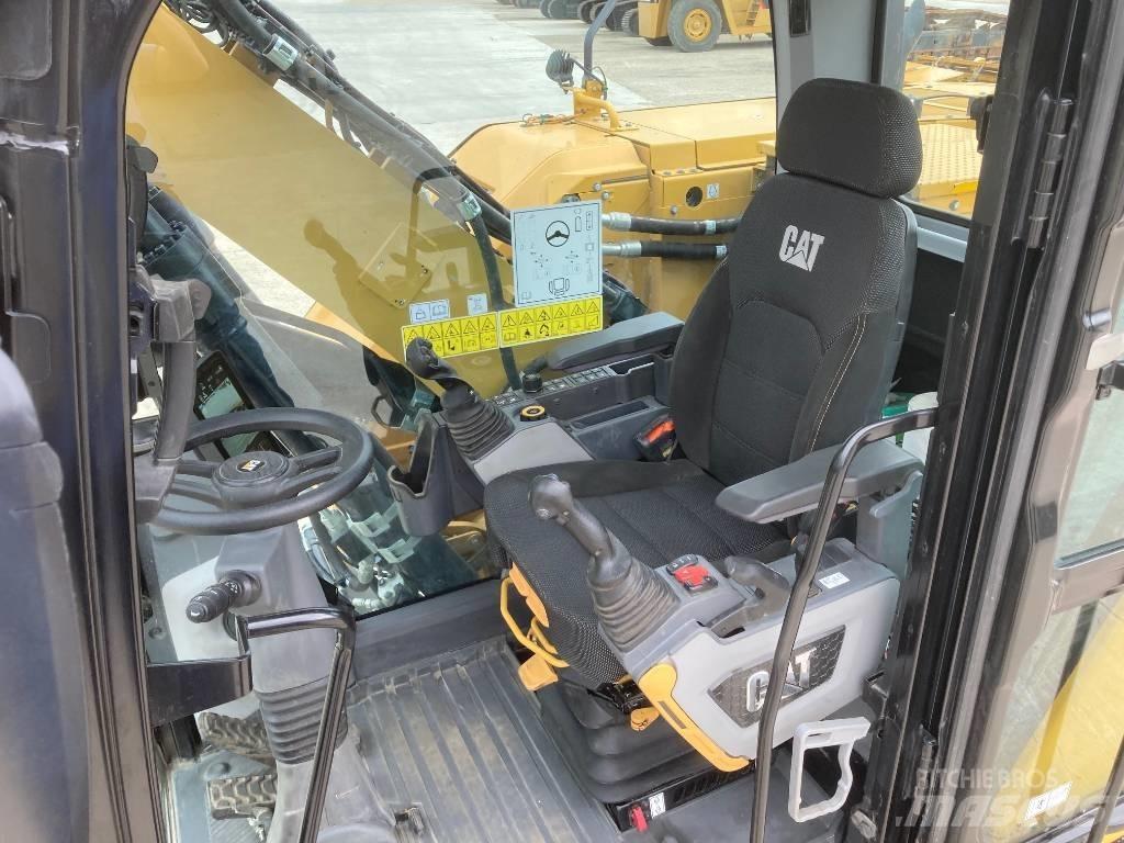 CAT M314 Bagri na kolesih