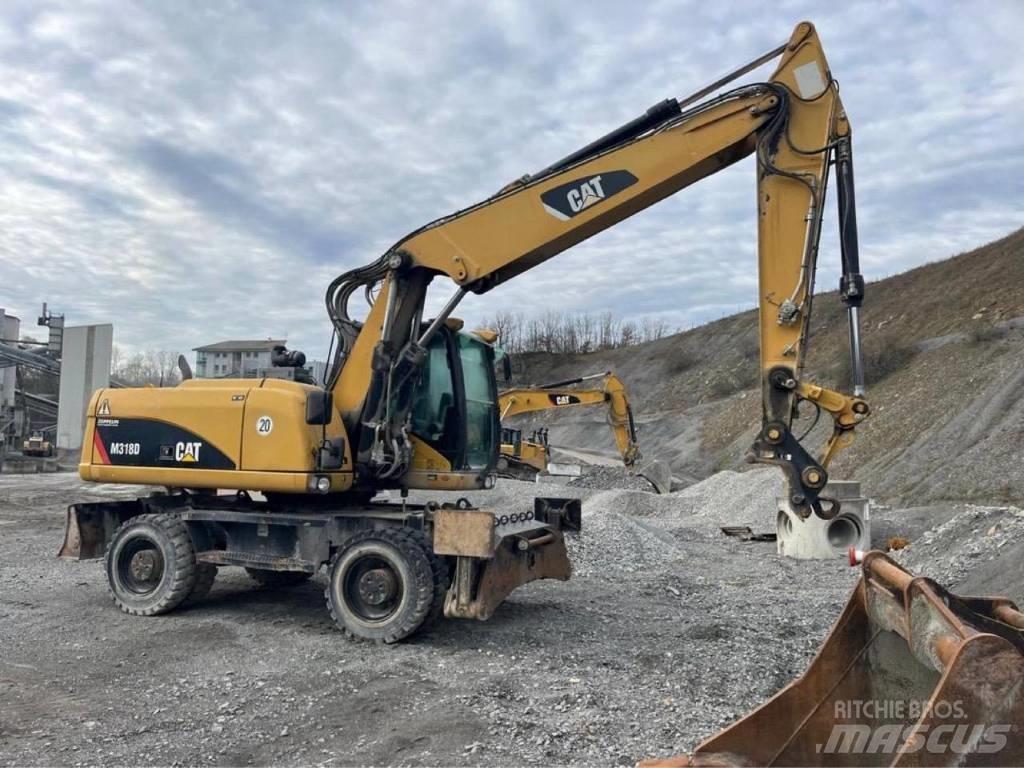 CAT M318D Bagri na kolesih