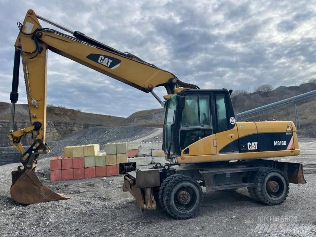 CAT M318D Bagri na kolesih