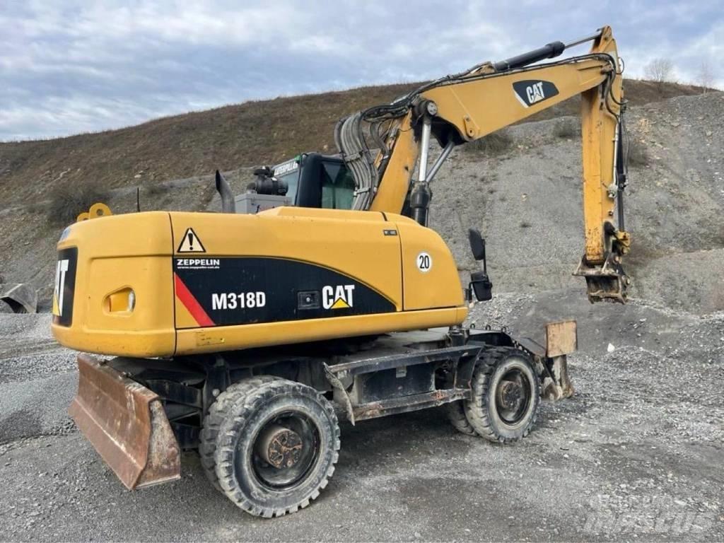 CAT M318D Bagri na kolesih