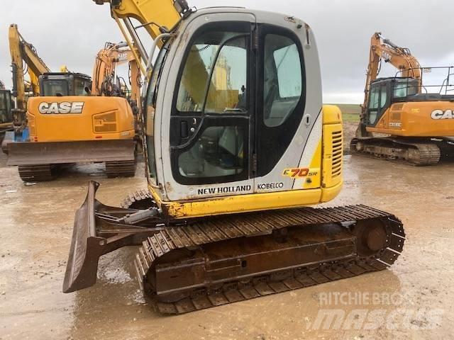 New Holland E 70 SR Midi bagri 7t – 12t