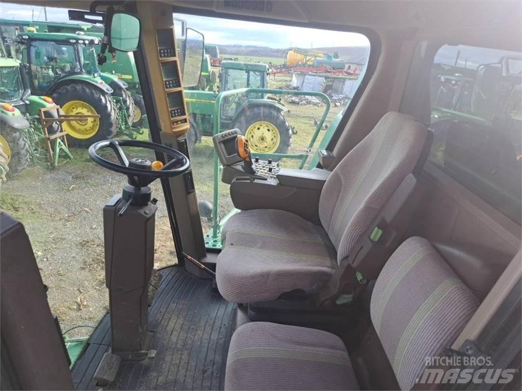 John Deere W650 Kombajni