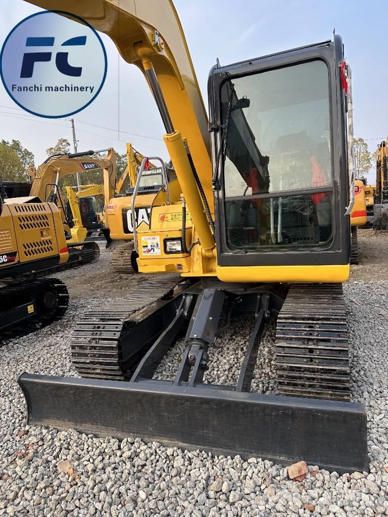 Komatsu 70 Bagri goseničarji