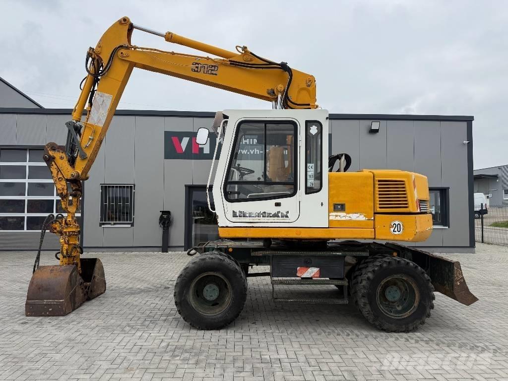Liebherr A 312 Bagri na kolesih