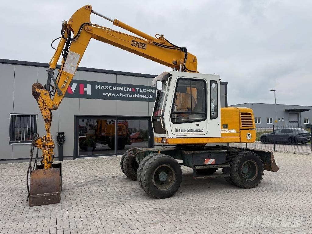 Liebherr A 312 Bagri na kolesih