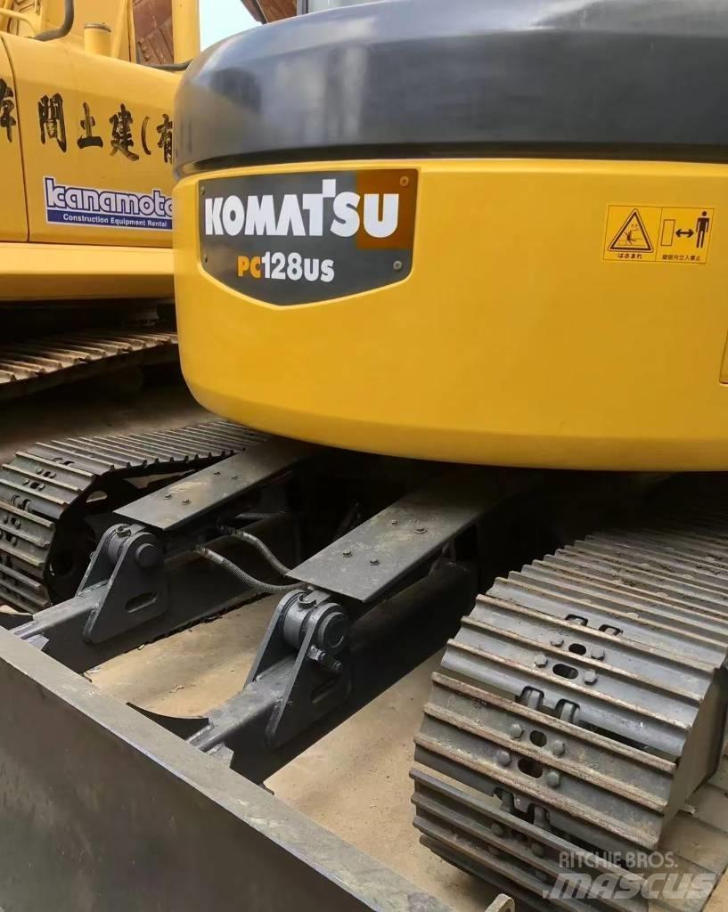 Komatsu 128 US Bagri goseničarji