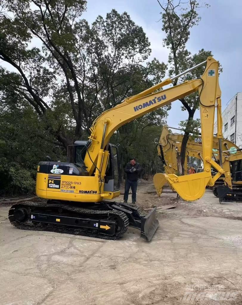 Komatsu 128 US Bagri goseničarji