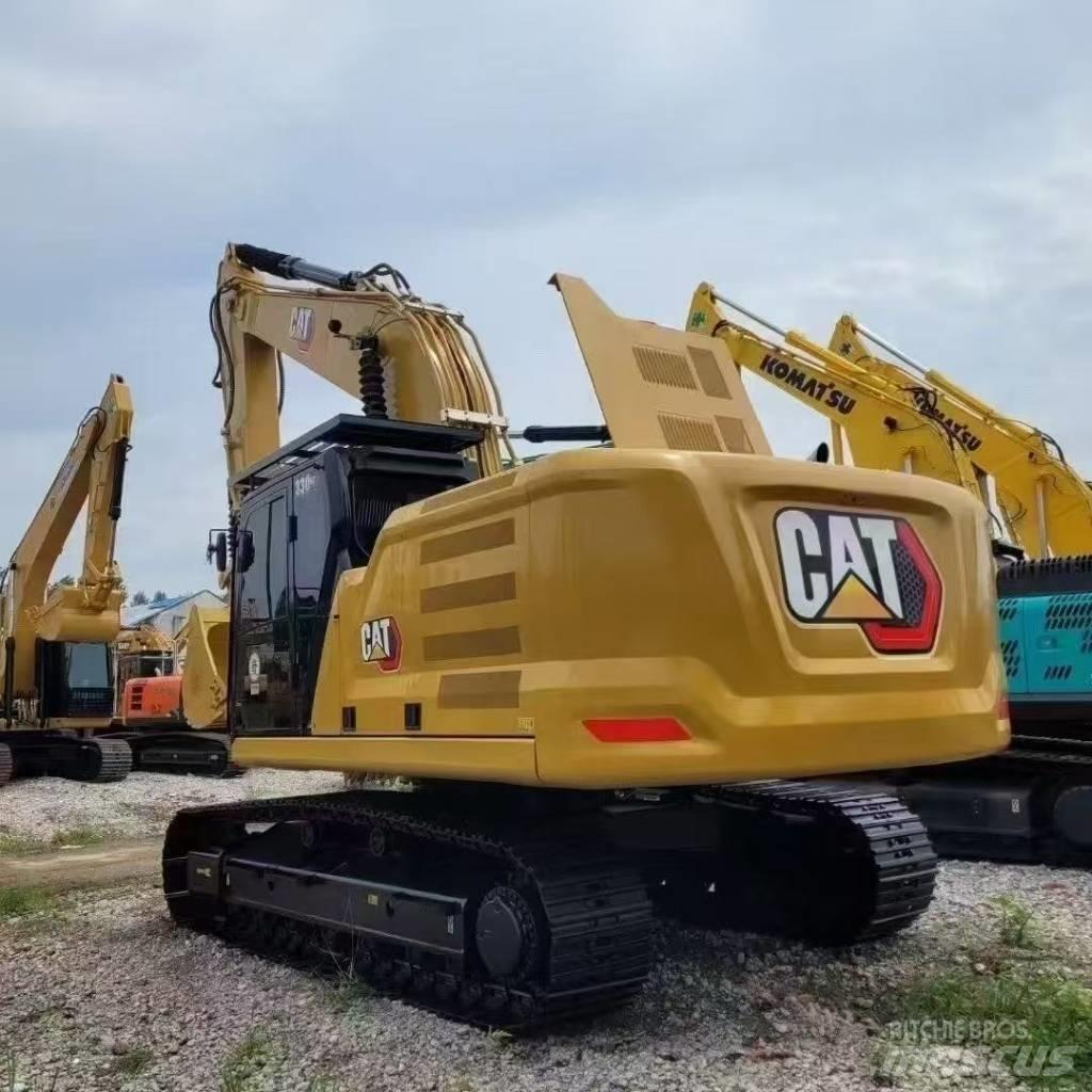 CAT 320 Bagri goseničarji