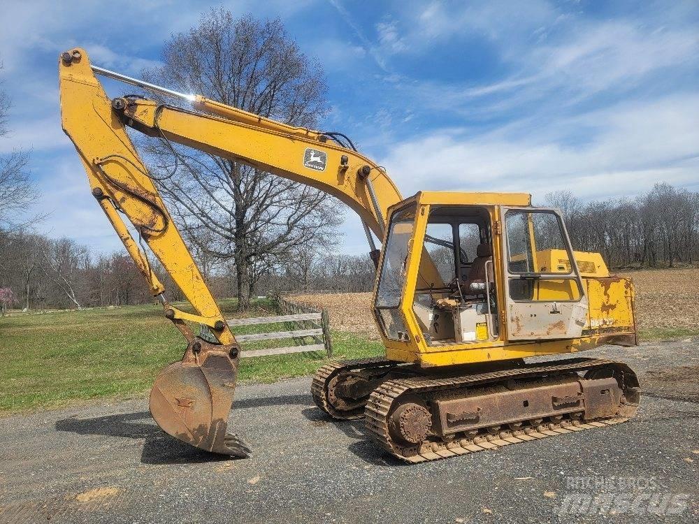 John Deere 490 Bagri goseničarji