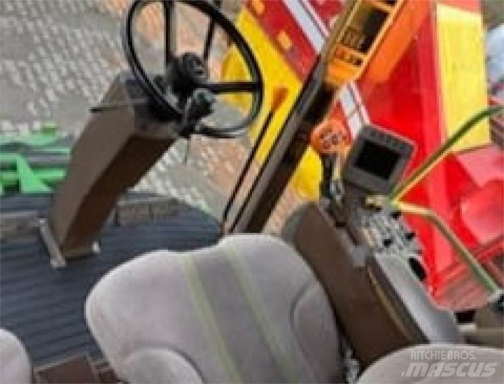 John Deere T560 Kombajni