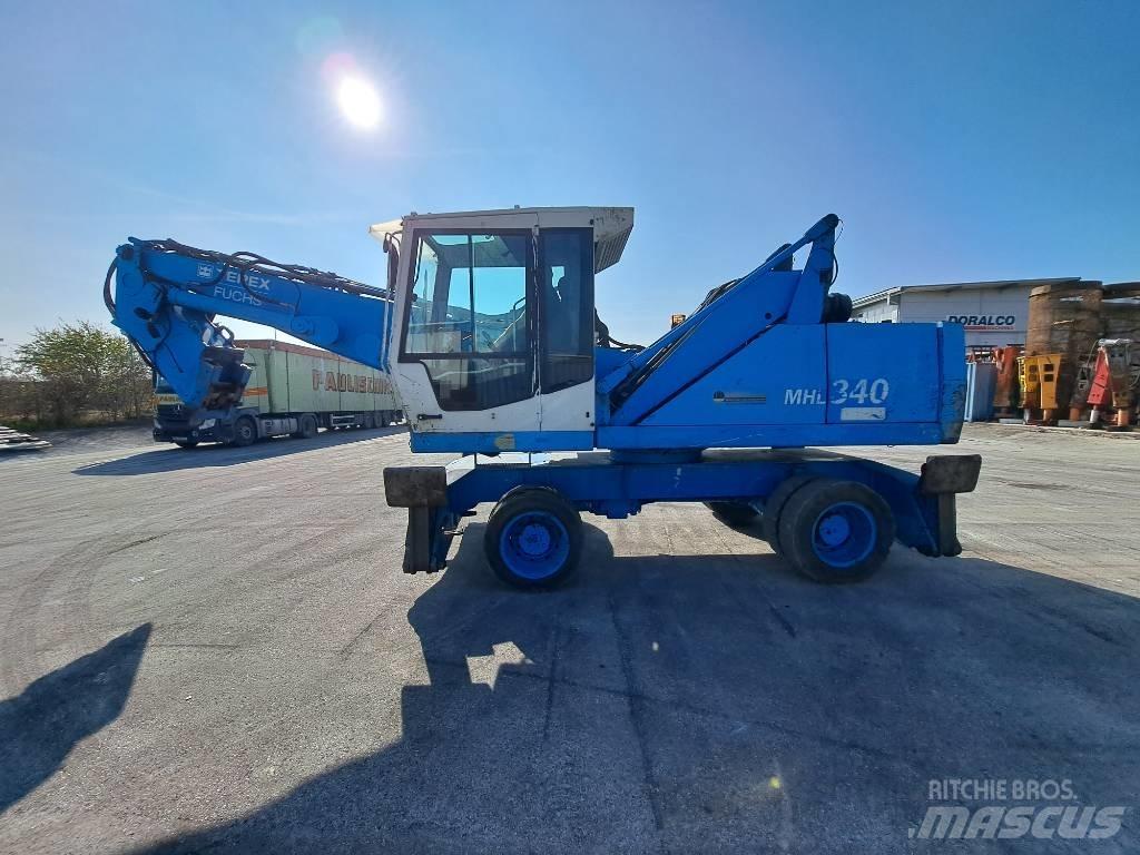Fuchs MHL  340C FQC Bagri za prekladanje primarnih/sekundarnih surovin