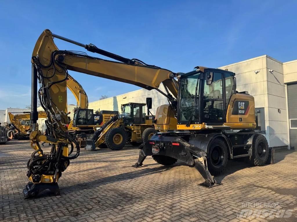 CAT M315F Bagri na kolesih