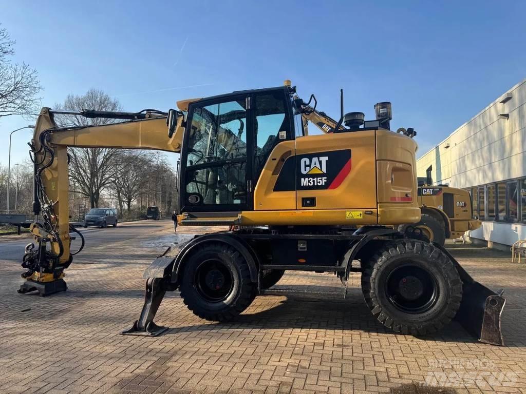 CAT M315F Bagri na kolesih