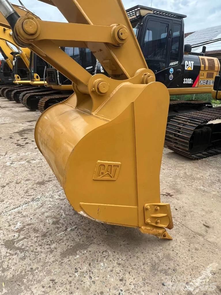 CAT 320 Bagri goseničarji
