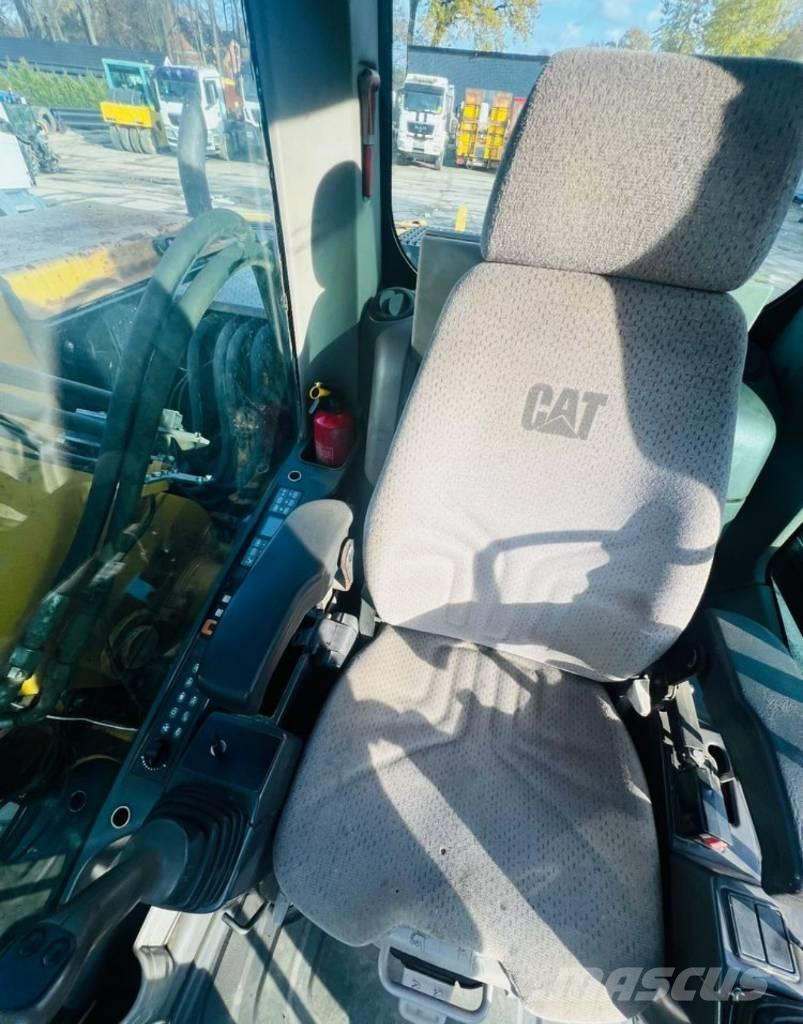 CAT M313D Bagri na kolesih