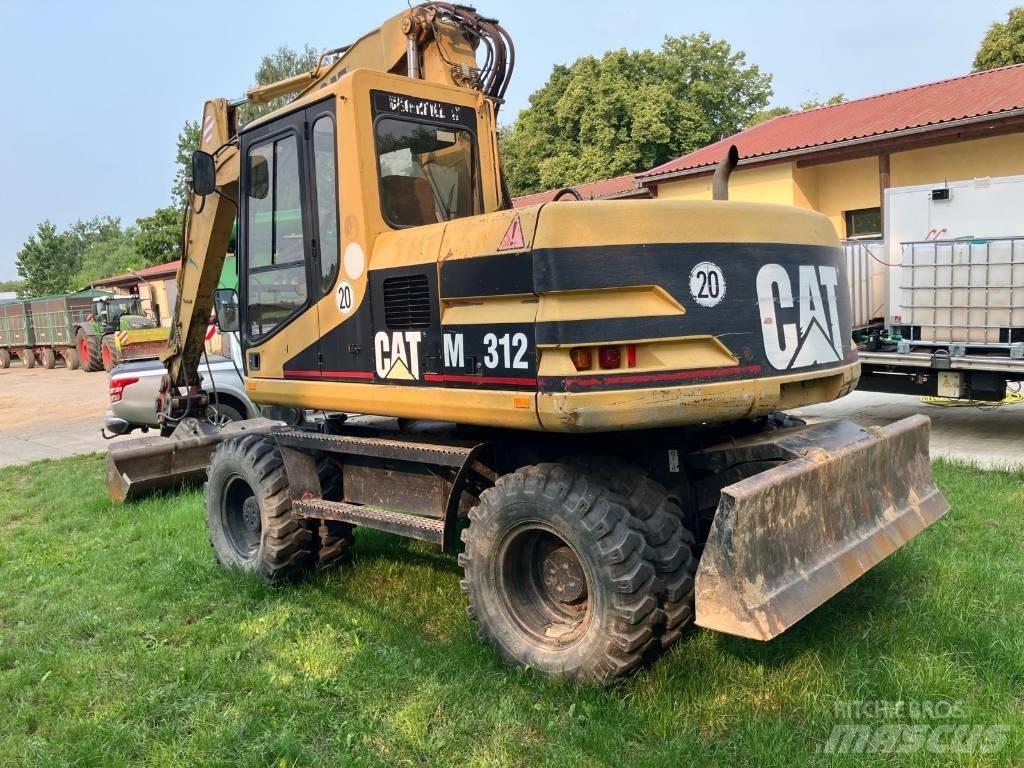 CAT M 312 Bagri na kolesih