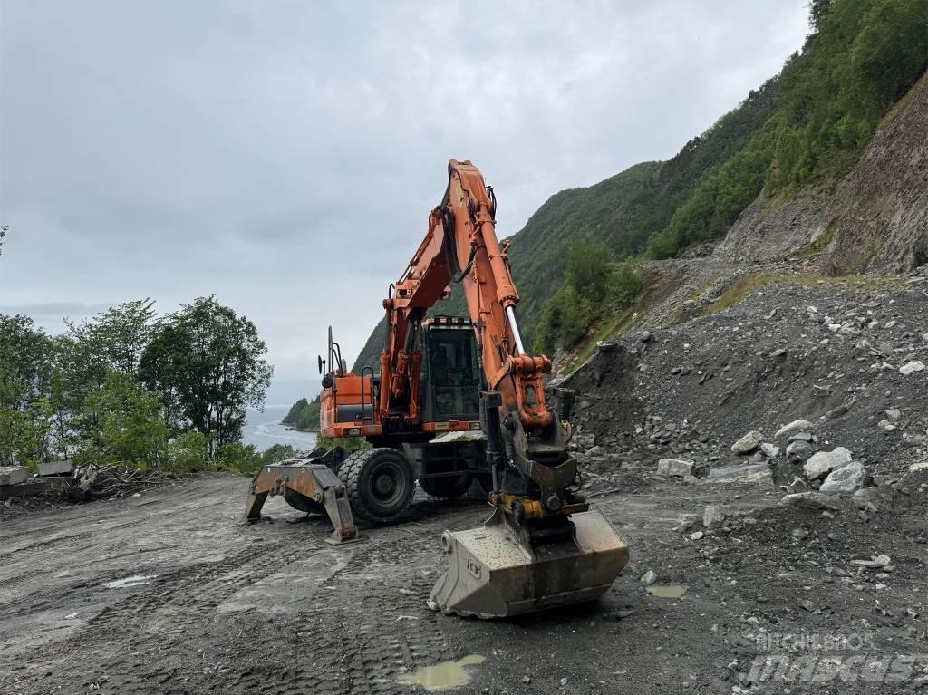 Doosan 140 W Bagri na kolesih