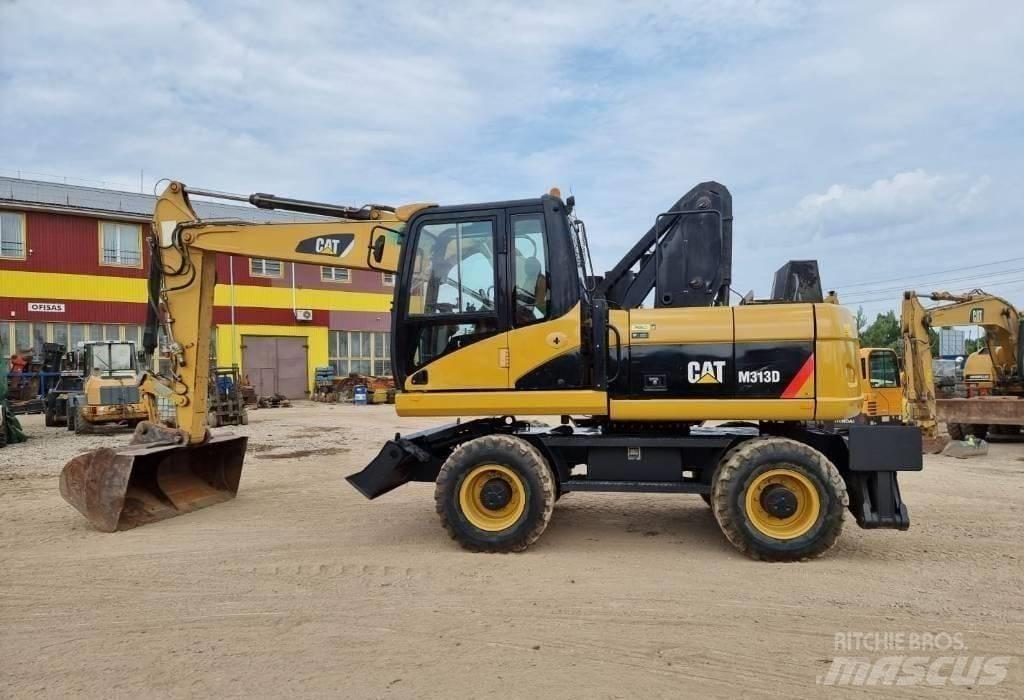 CAT M313 D Bagri na kolesih